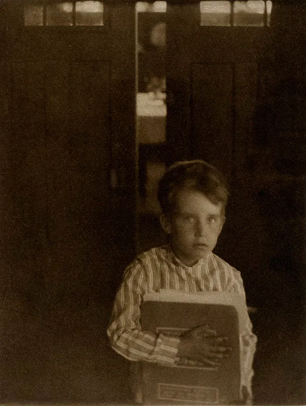 Boy with Camera Work