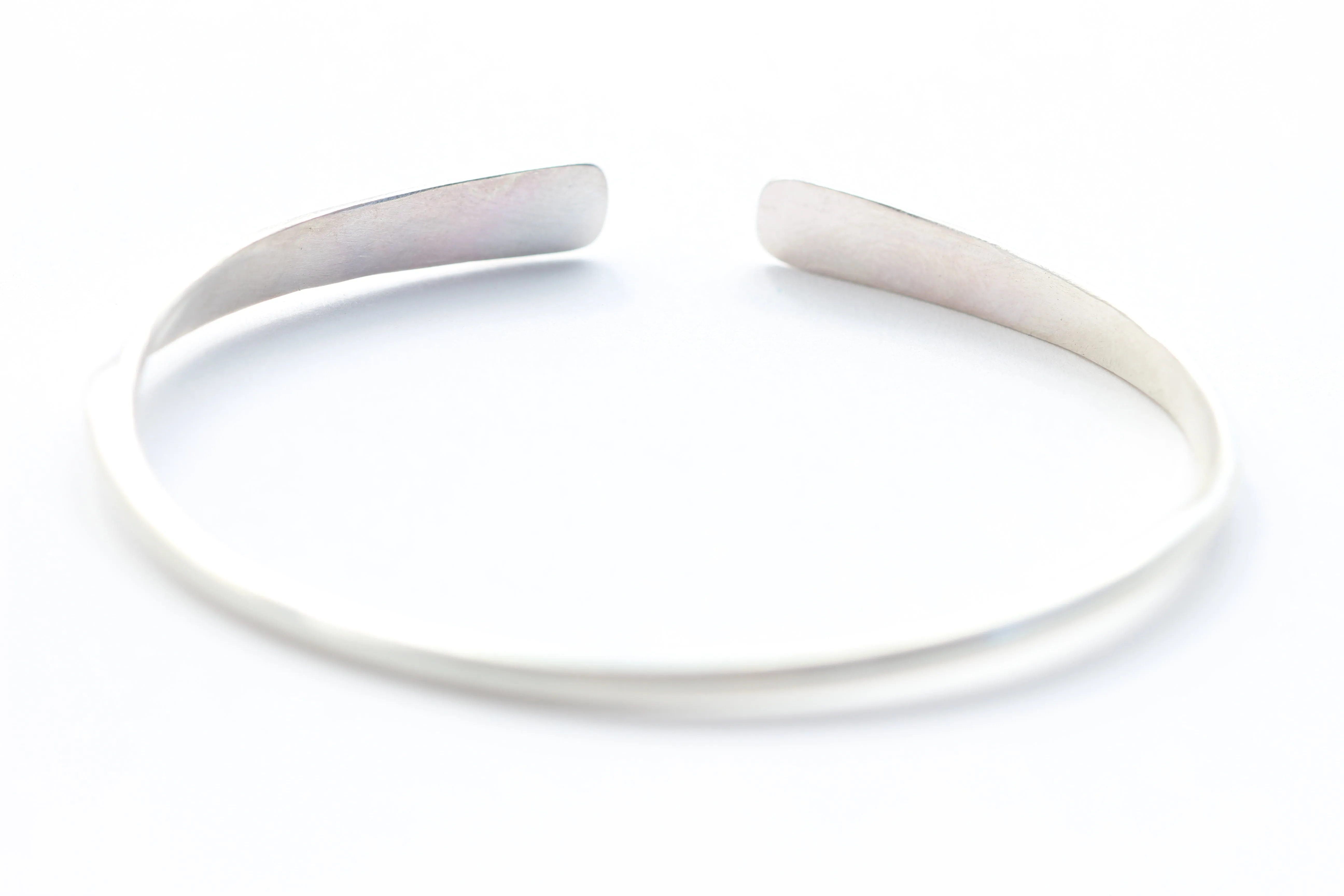 Slightly Twisted Sterling Silver and 14k Gold Bracelet