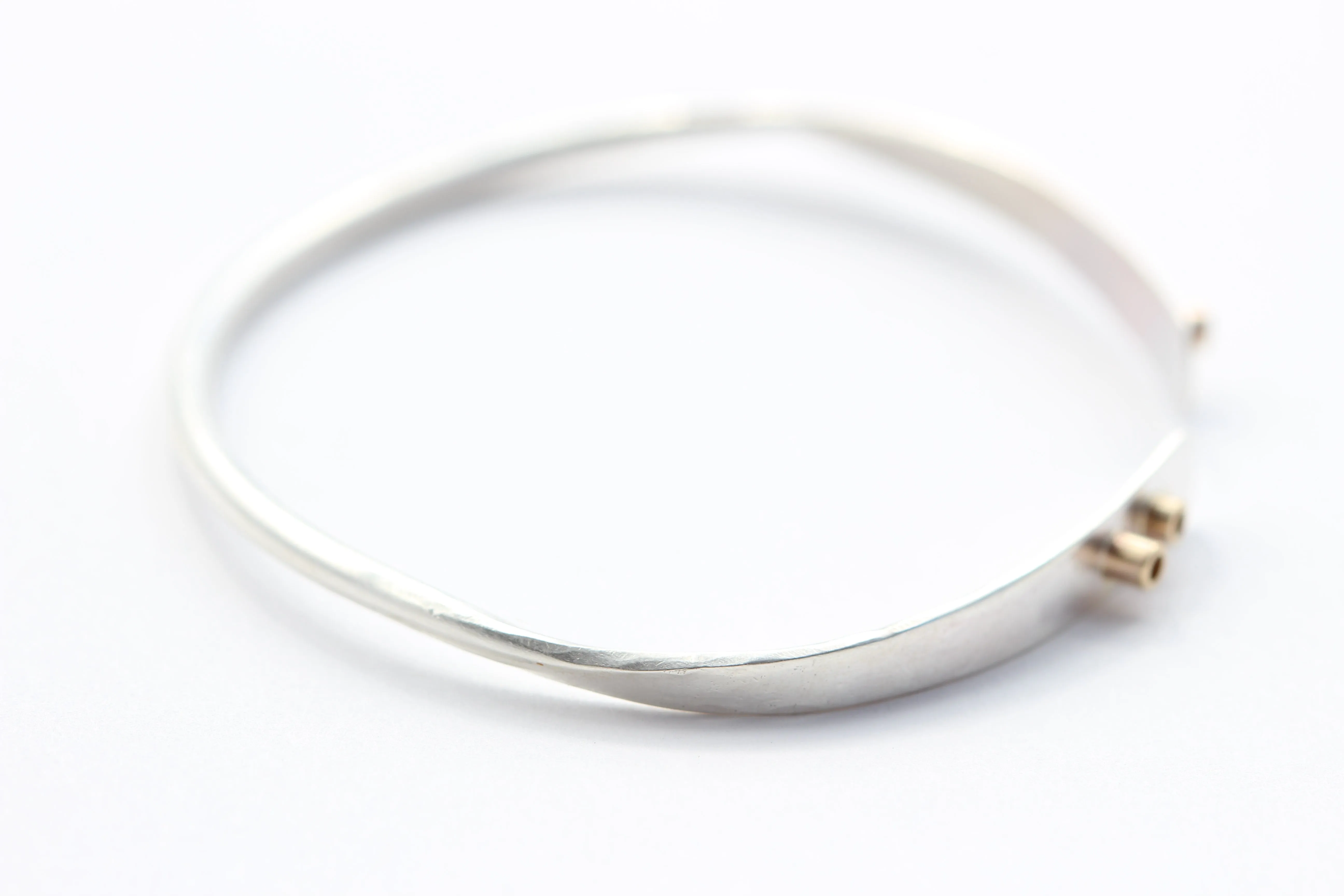Slightly Twisted Sterling Silver and 14k Gold Bracelet